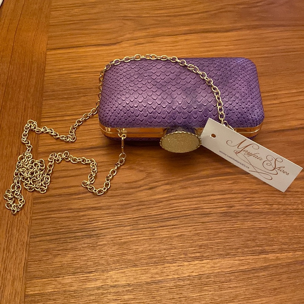 NWT purple snake print clutch